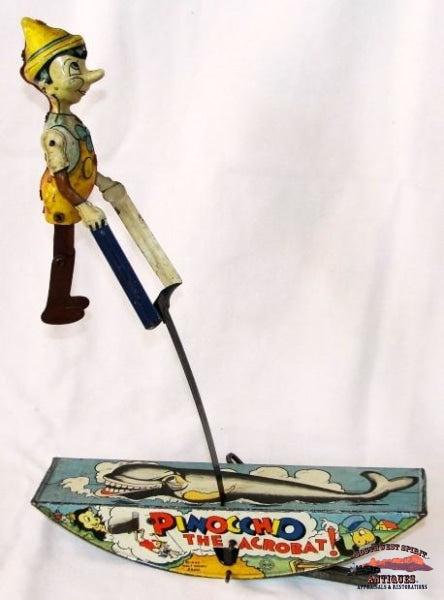 1939 Marx Co. "Pinocchio The Acrobat" Tin Wind-up Toy Southwest Spirit Antiques & Certified Appraisals 1939 Marx Co. "Pinocchio The Acrobat" Tin Wind-up Toy Southwest Spirit Antiques & Certified Appraisals