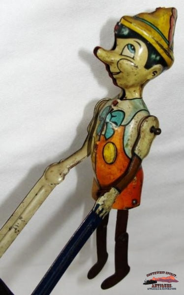 1939 Marx Co. "Pinocchio The Acrobat" Tin Wind-up Toy Southwest Spirit Antiques & Certified Appraisals 1939 Marx Co. "Pinocchio The Acrobat" Tin Wind-up Toy Southwest Spirit Antiques & Certified Appraisals